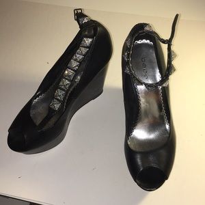 Bebe open toe studded wedge heels.